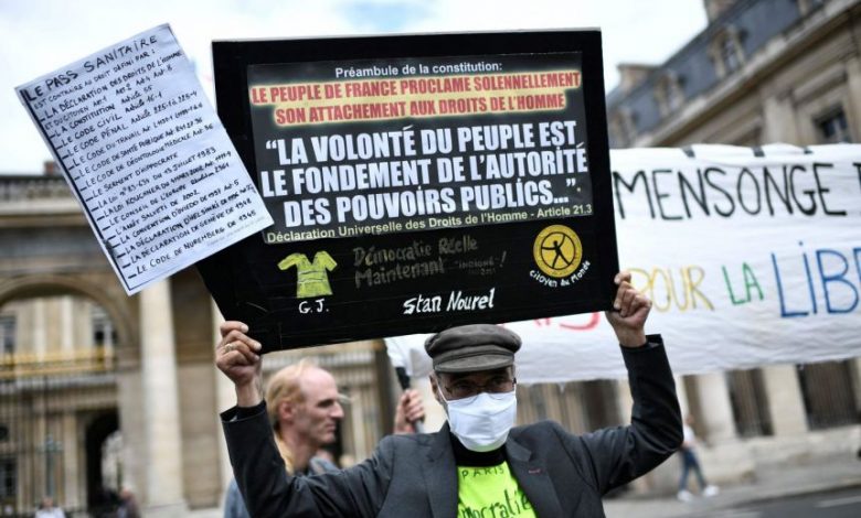 المجلس الدستور الفرنسى يقر غالبية بنود قانون توسيع استخدام الشهادة الصحية